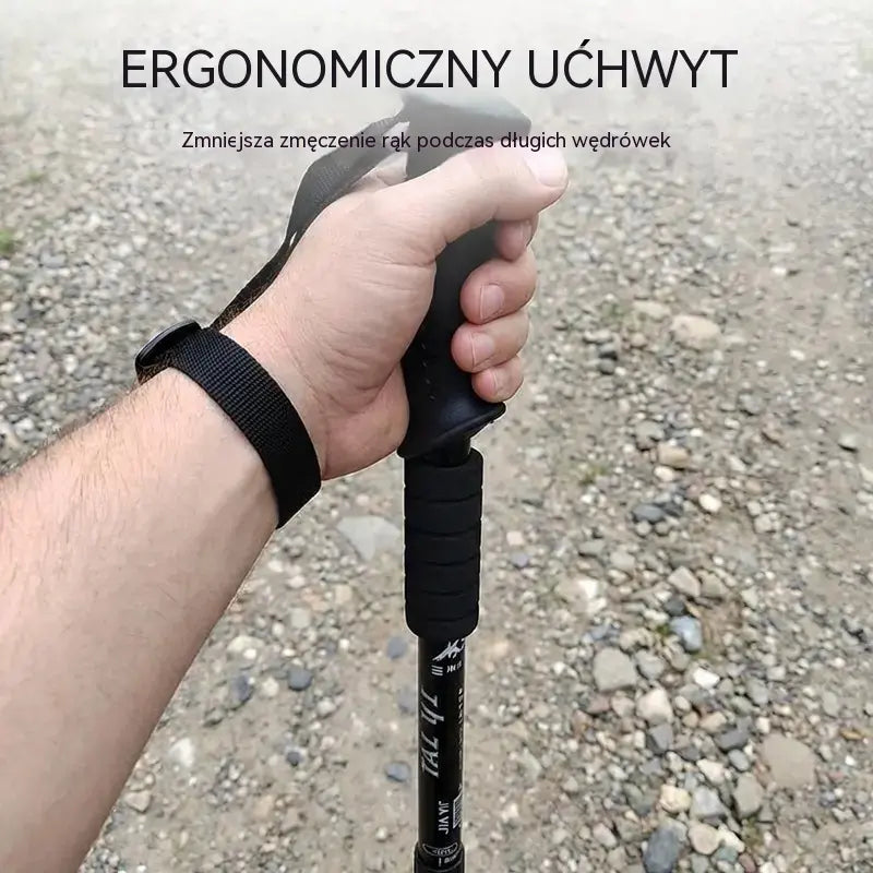 Regulowany kij trekkingowy ze stopu aluminium: wytrzymały, amortyzujący wstrząsy i lekki.